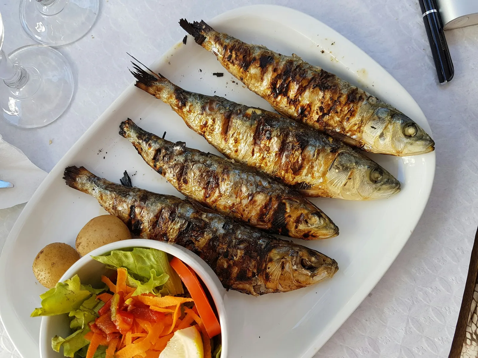 Grilled sardines, a familiar sight on a Portuguese table